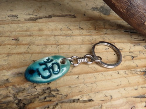 OM – ceramiczny amulet harmonii - breloczek