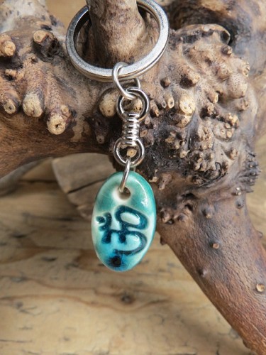 OM – ceramiczny amulet harmonii - breloczek