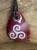 wisior triskelion na kamieniu - aragonit - amulet na rzemieniu