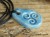 Ceramiczny wisior Triskelion – niebieskie szkliwo - rękodzieło