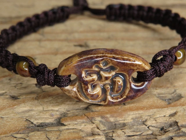 OM – ceramiczna bransoletka makrama - symbol harmonii